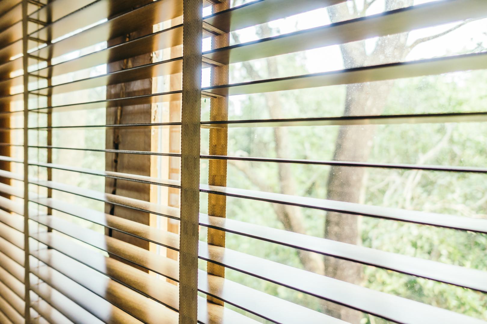 A close-up of a window with blinds.