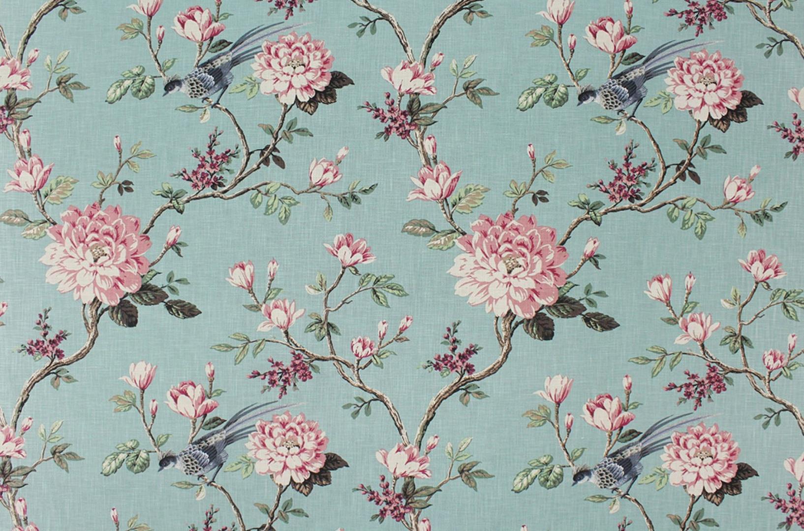Pink and blue floral patterned upholstery fabric.