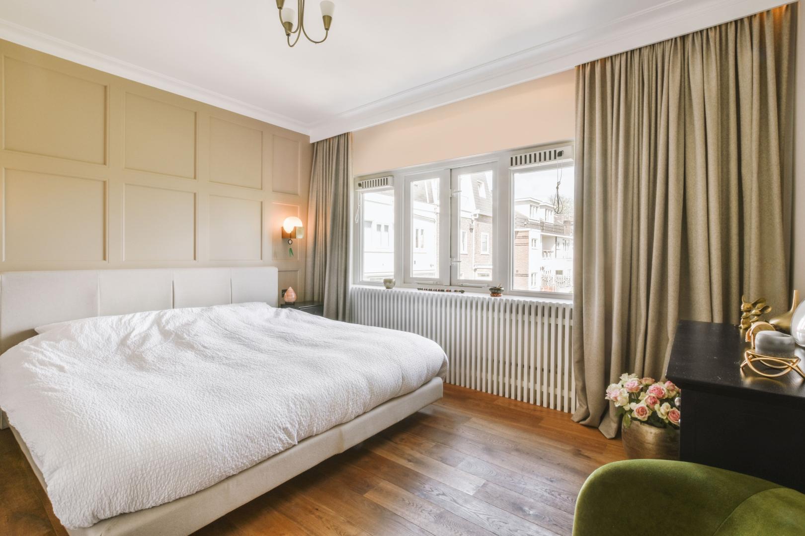 A bright bedroom with blackout curtains.
