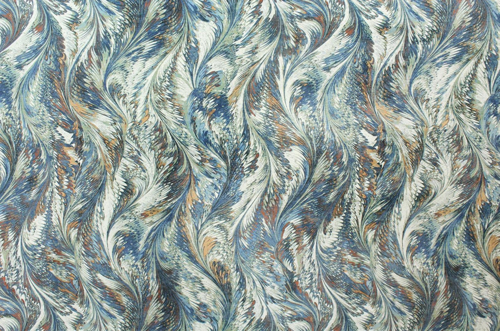 Blue patterned chenille upholstery fabric.