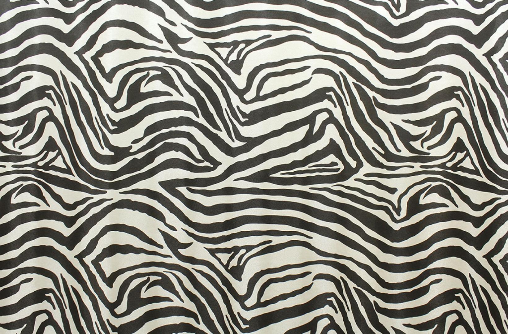 Zebra patterned vinyl upholstery fabric.