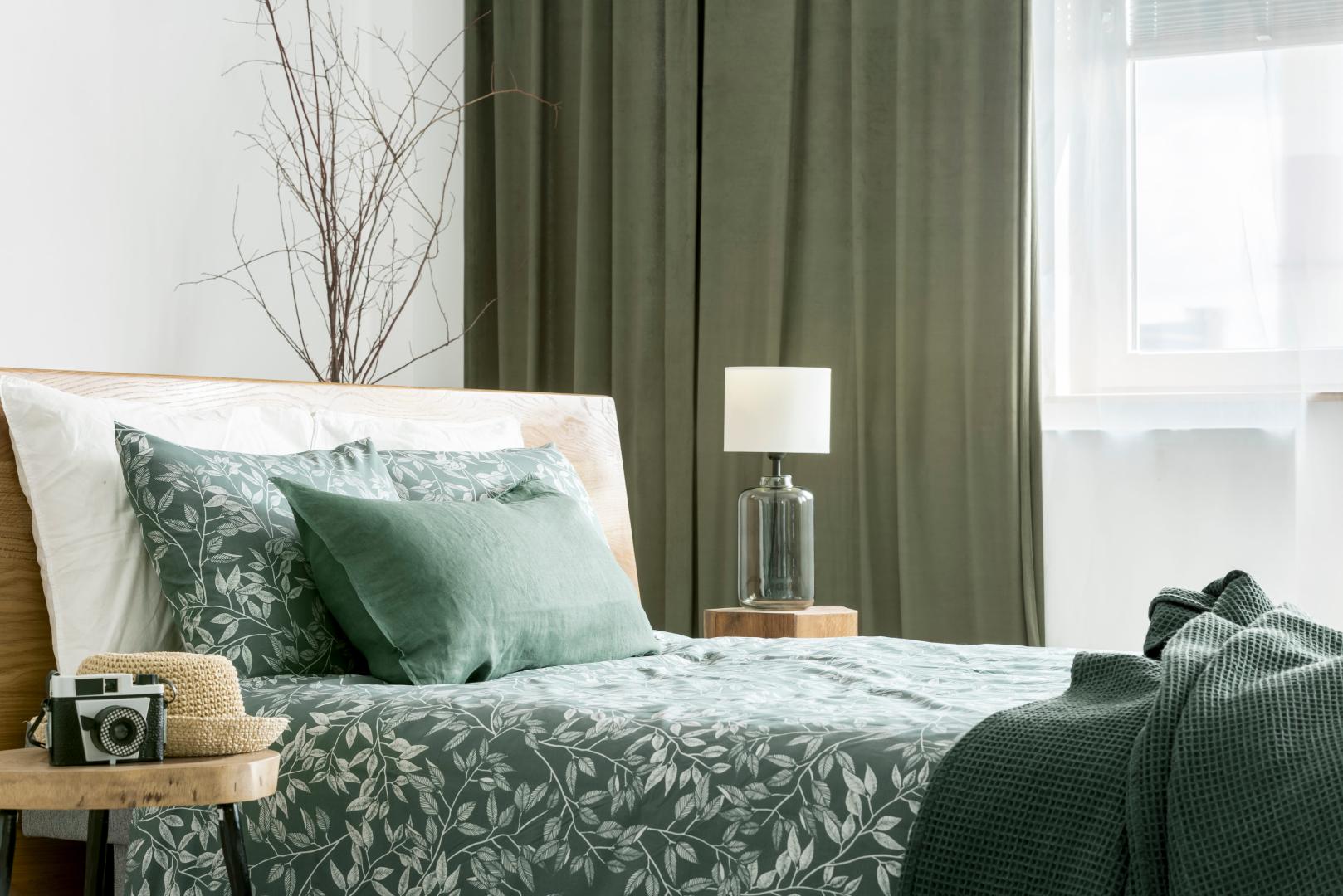 A bedroom in green tones.