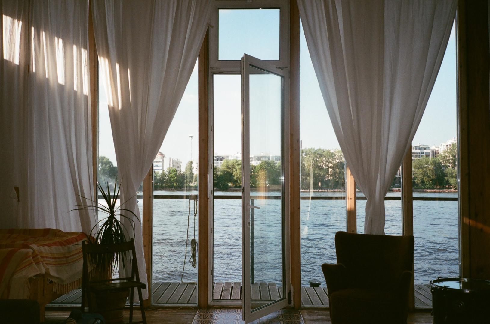 A glass door with custom drapery.