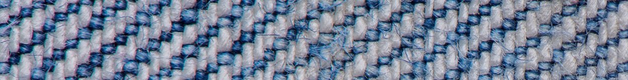 Perspective and closeup view to abstract space of empty light blue natural clean denim texture for the traditional business background in cold bright colors with diagonal shift tilt lines and stitches