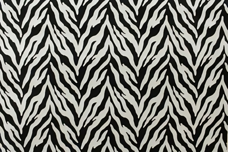A zebra print upholstery fabric print in shades of black and white.